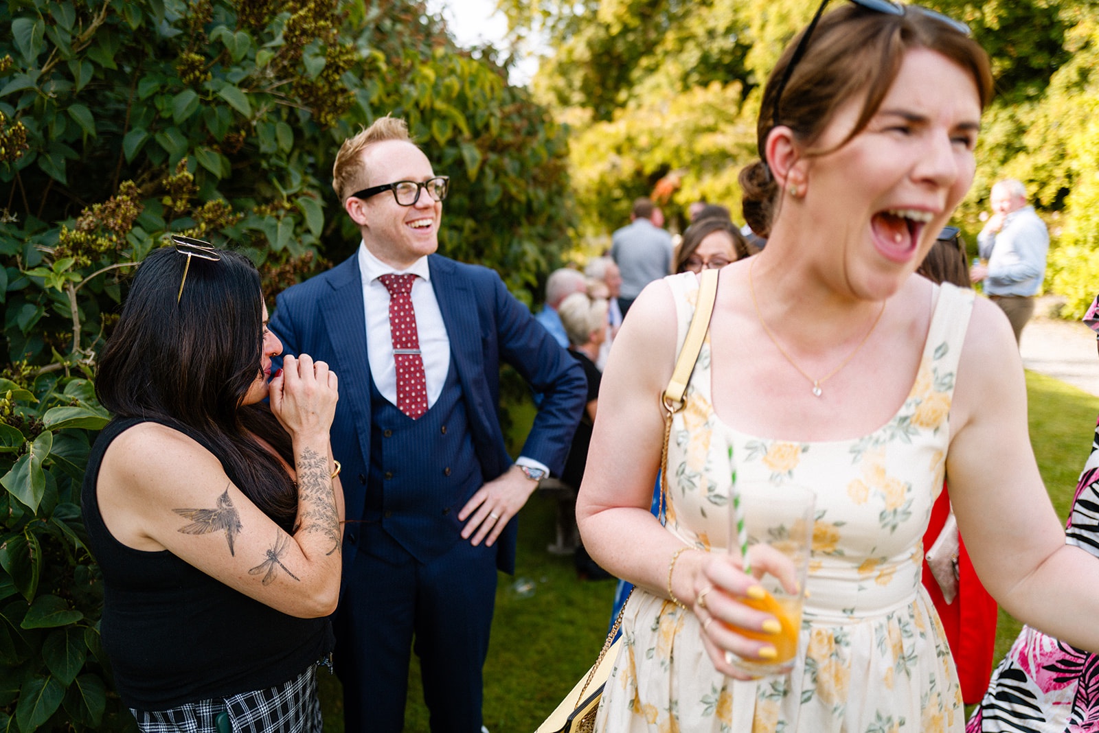 Wedding guest laughing in disbelief